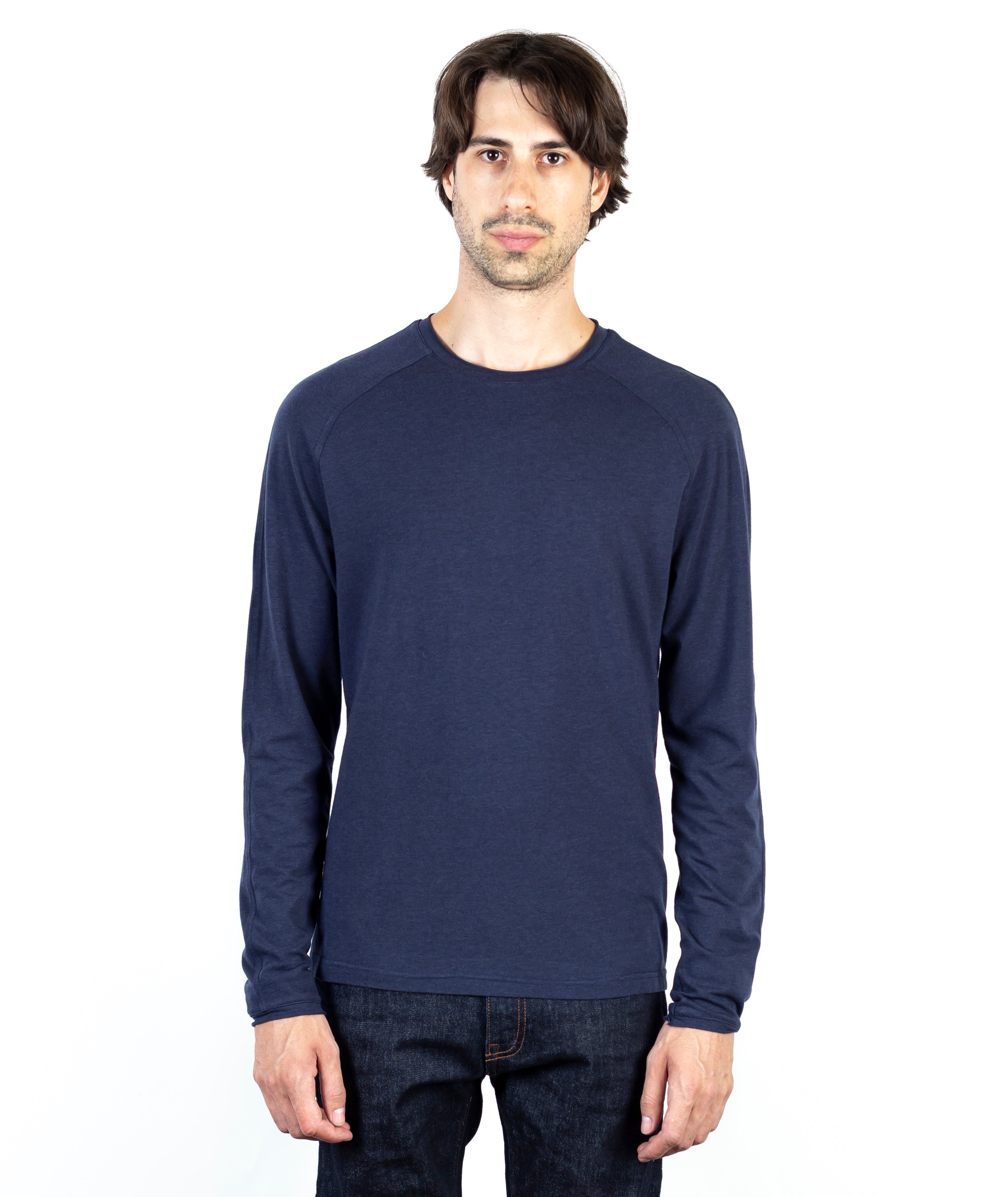 Model wearing Jude Neale long sleeve shirt from the KIP collection, highlighting relaxed structure, soft texture, and elevated everyday style.
