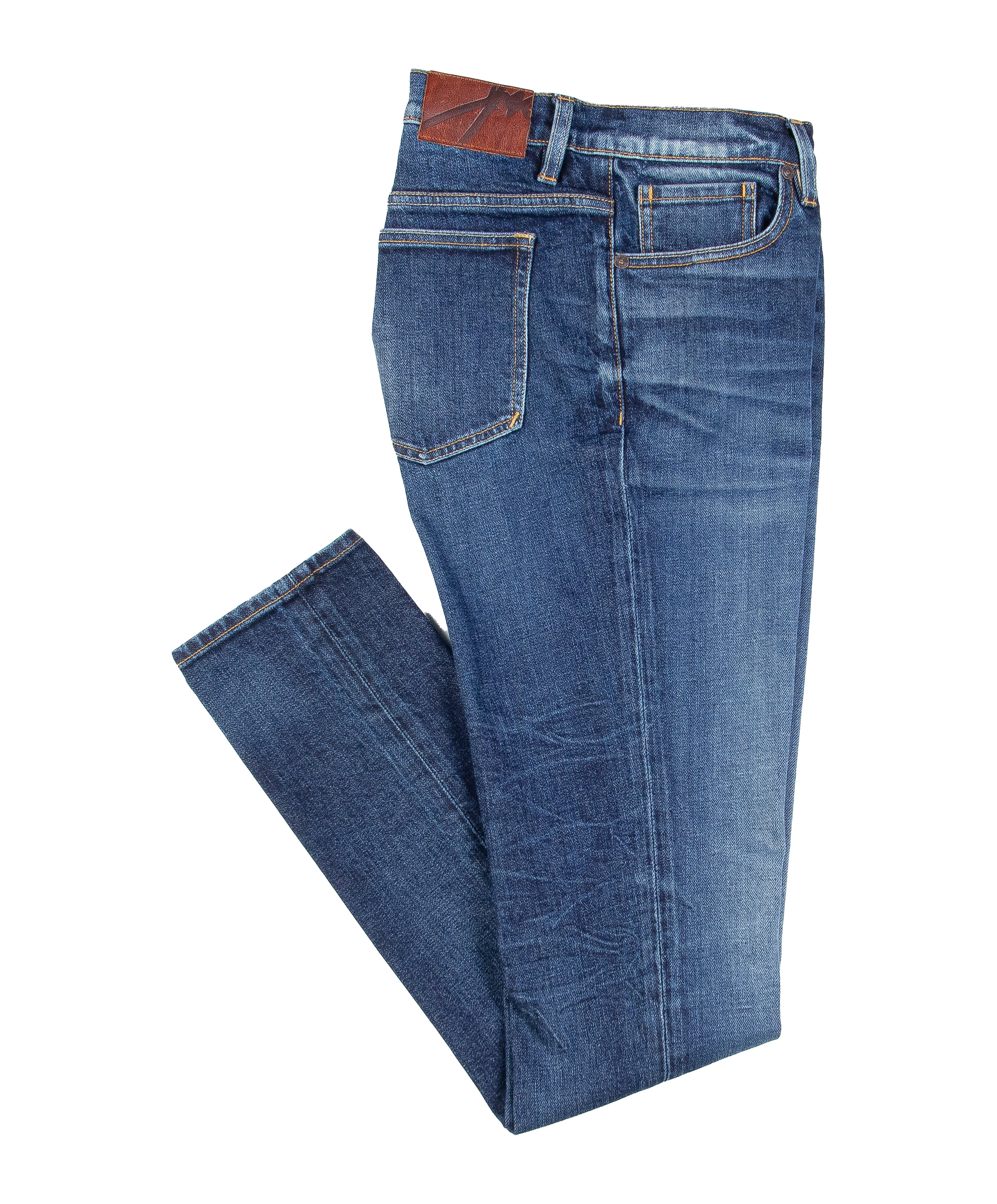 Folded flat lay of Blade Oxford Slim Tapered Fit Jeans showing rich Italian denim in a timeless vintage wash.