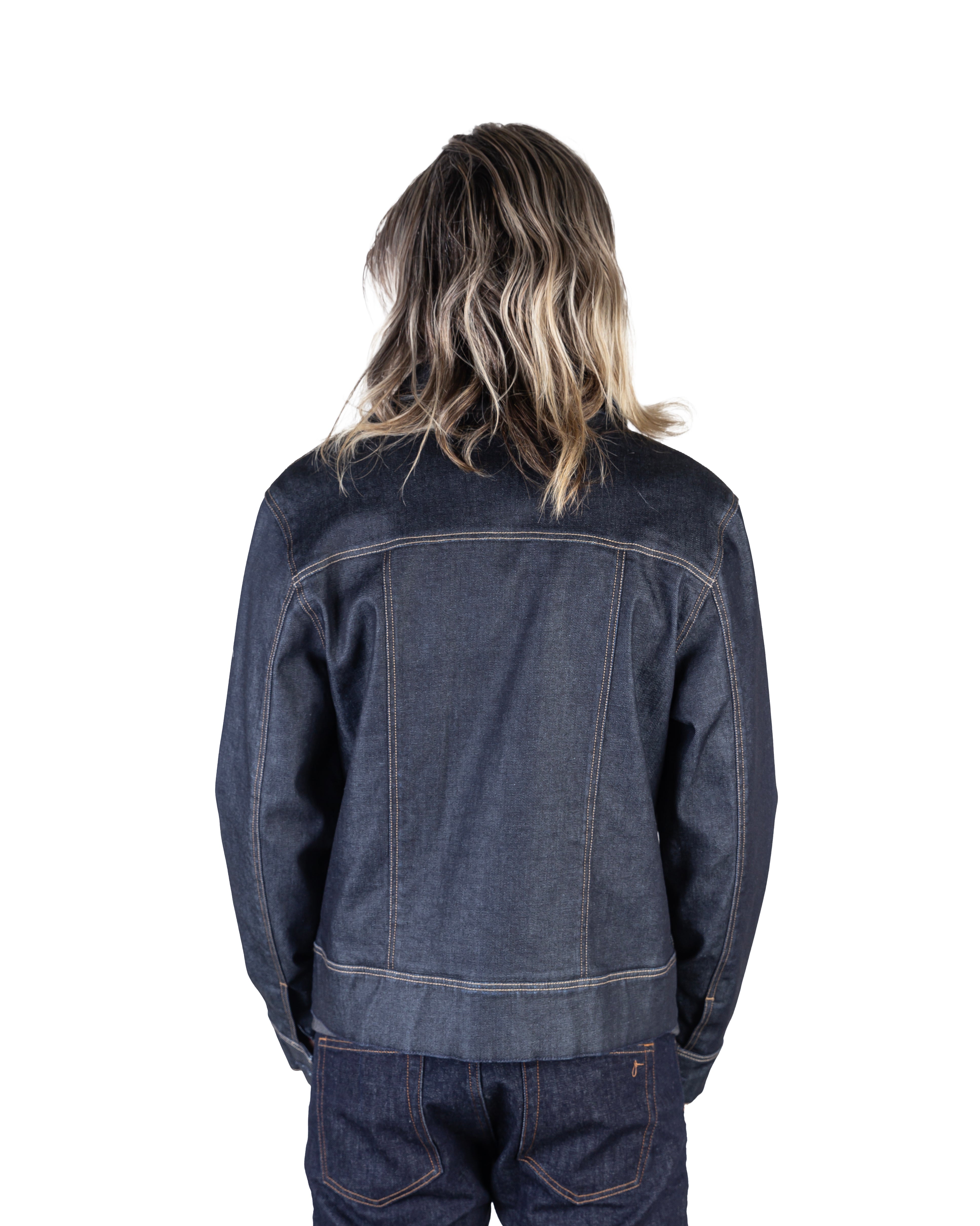 Model wearing the Hawk Raw Slim Fit Denim Jacket, facing away, showcasing its classic design and raw wash finish.
