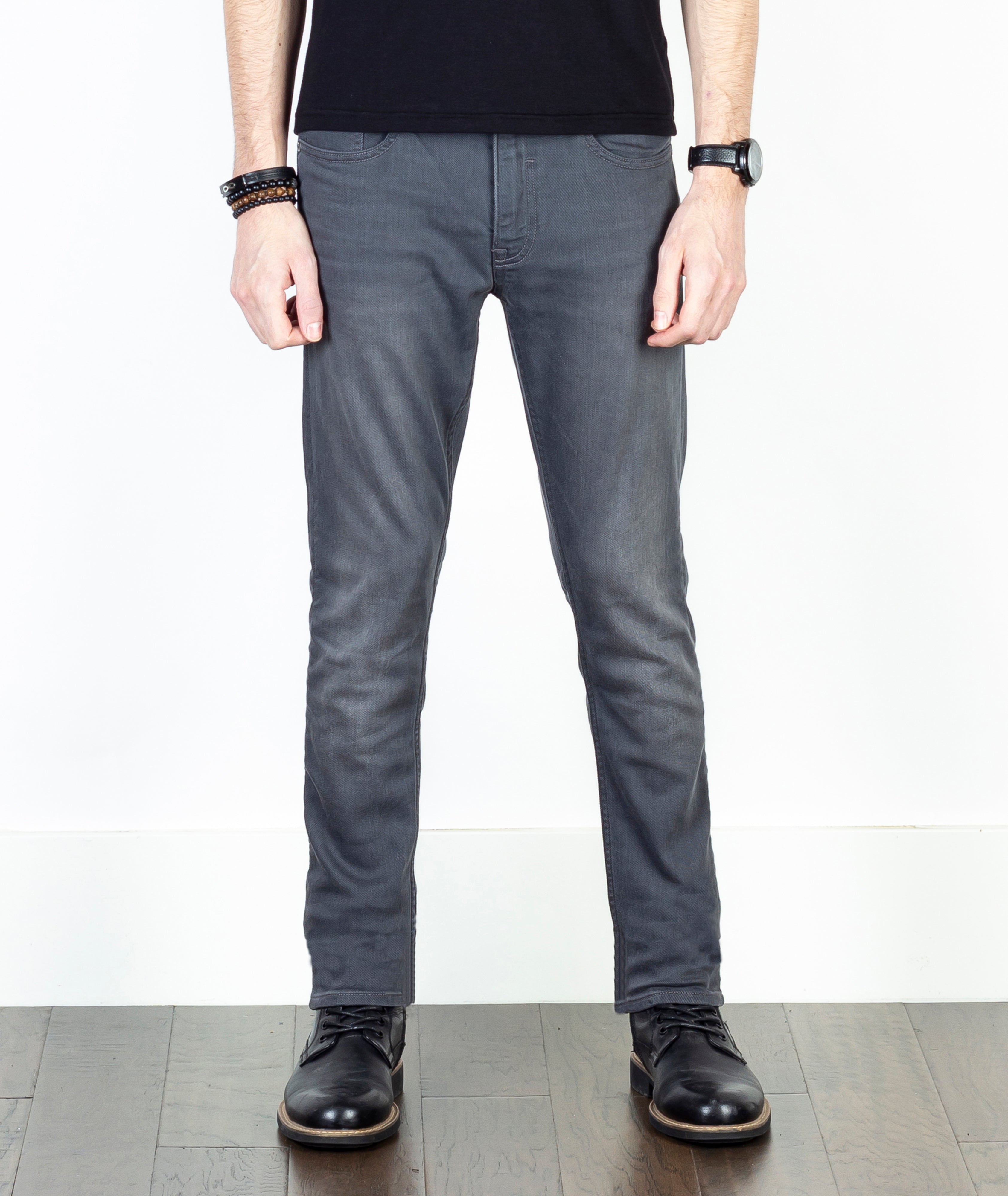 Axe Ash Slim Straight Comfort Fit Jeans – Close-up shot of model wearing jeans, showcasing the fit and detailing from the front