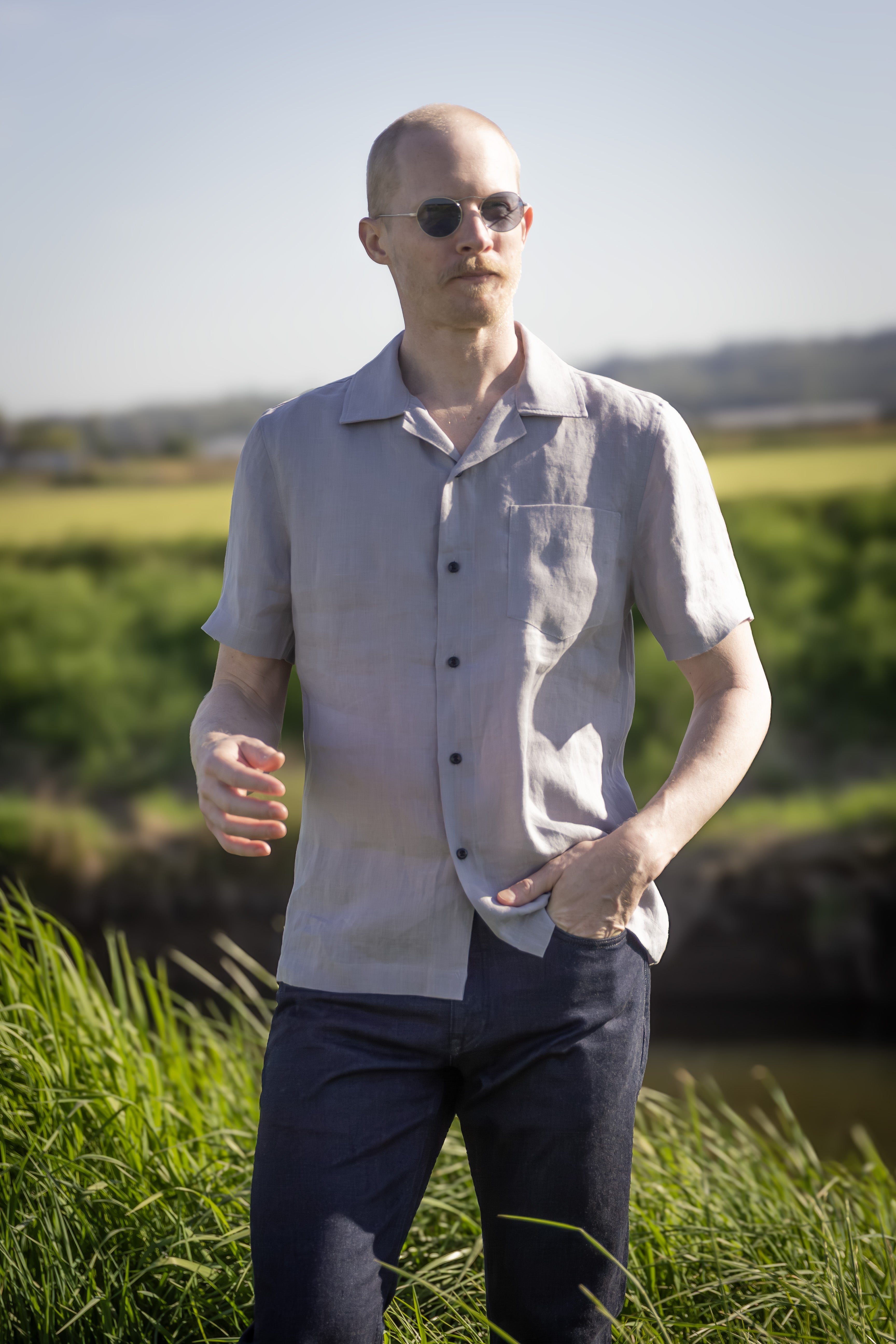 Model wearing the Rogan Waffle shirt by Jude Neale from the Tops Collection, showcasing textured knit and casual, refined style.